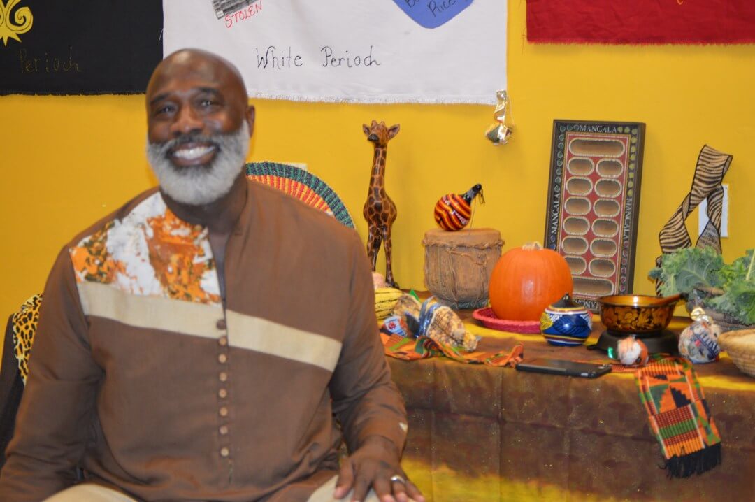 man sitting at table