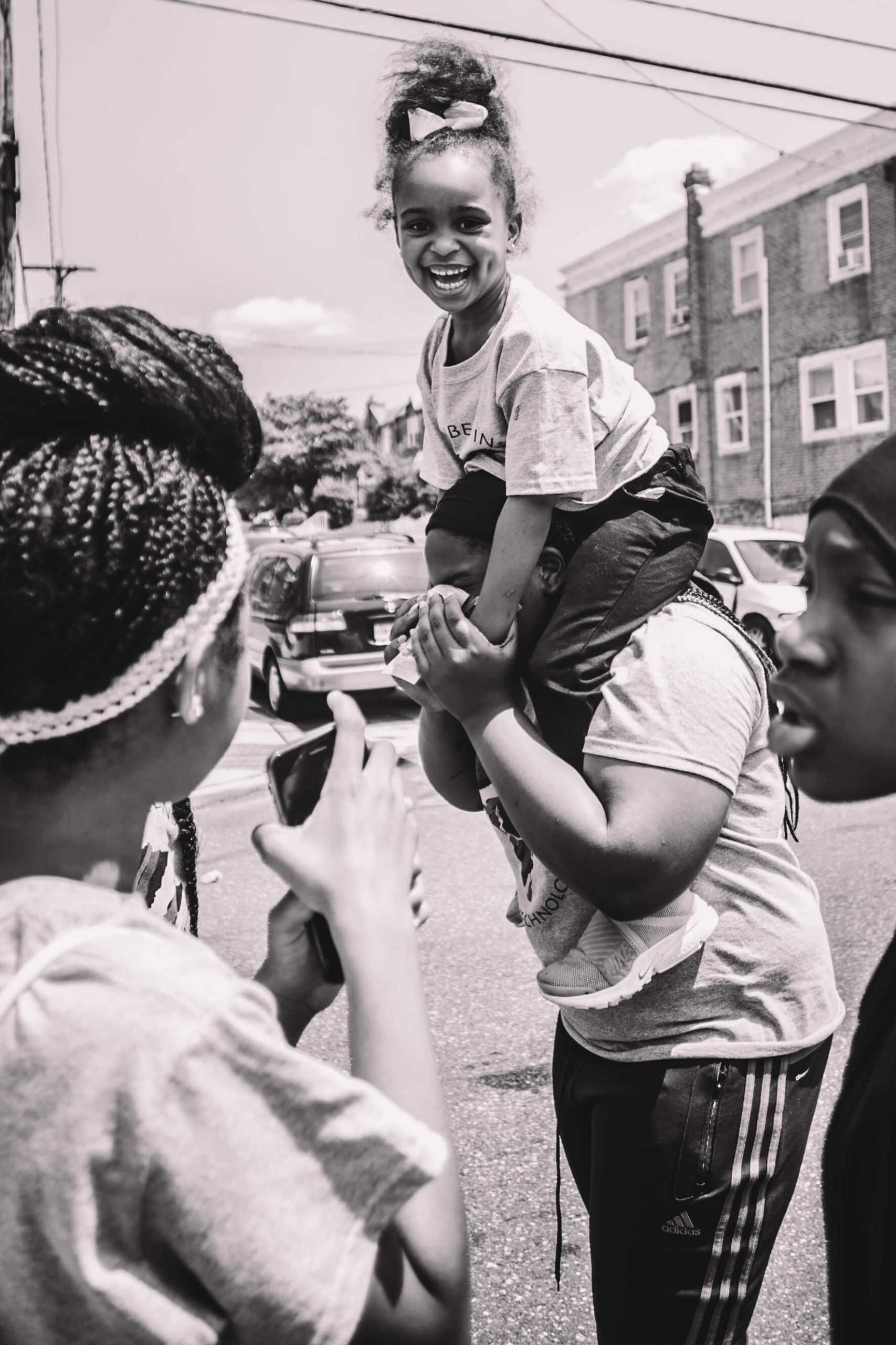 kid on shoulders